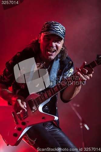 Image of DNIPROPETROVSK, UKRAINE - OCTOBER 31: Matthias Jabs from Scorpions rock band performs live at Sports Palace SC \"Meteor\". \"Final tour\"concert on October 31, 2012 in DNIPROPETROVSK, UKRAINE