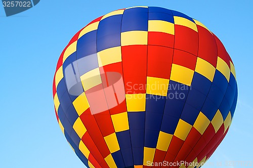 Image of hot air balloon of primary colors