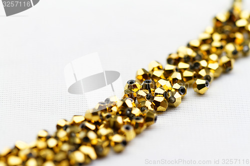 Image of Golden glass beads