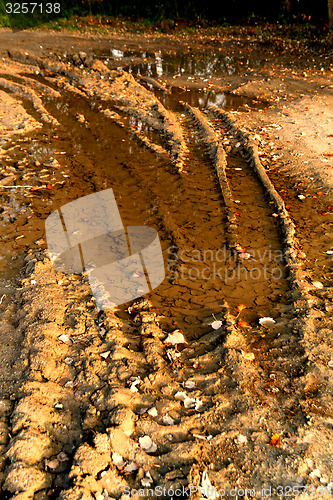 Image of Dirty broken rural road 