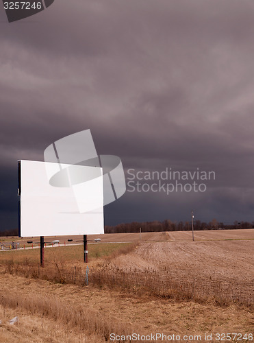 Image of White Blank Billboard Advertising Sign Farm Field Thunder Storm