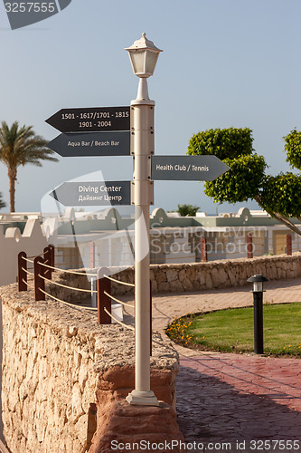 Image of signboard on the beach at hotel, Egypt