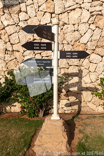 Image of signboard on the beach at hotel, Egypt