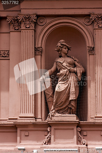 Image of pink marble statue of a women 