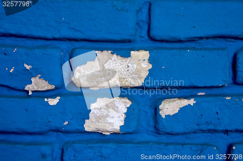 Image of colored and broken blue wall in uruguay