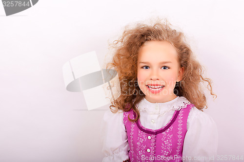 Image of Portrait of a small girl in traditional Bavarian clothes