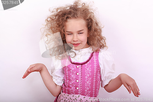 Image of Small Bavarian girl in the dirndl in pose