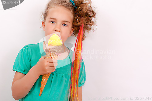 Image of Young girl with giants ice-cream cone