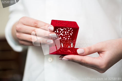 Image of  Wedding Ring in Red Velvet Silk Box