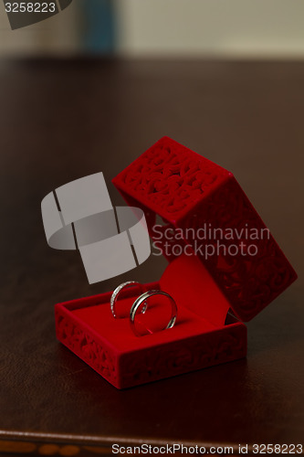 Image of Wedding Ring in Red Velvet Silk Box 