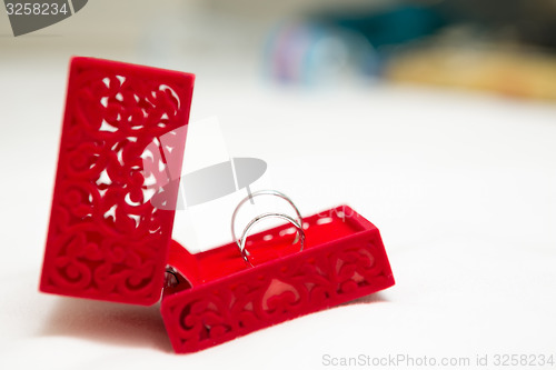 Image of Wedding Ring in Red Velvet Silk Box 