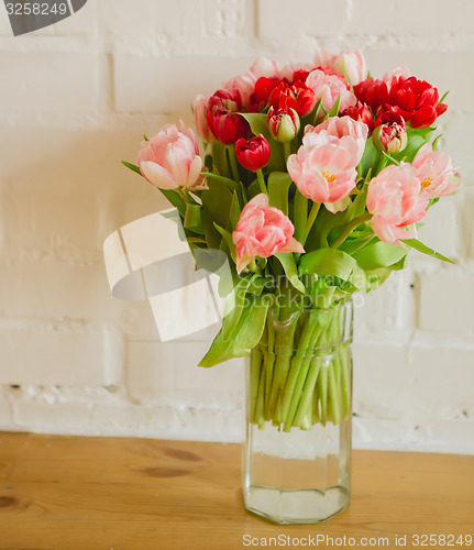 Image of bouquet of tulips on white background for advertising