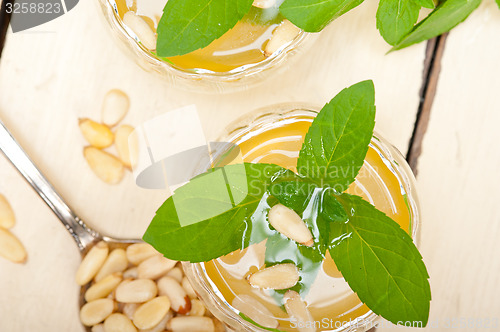 Image of Arab traditional mint and pine nuts tea