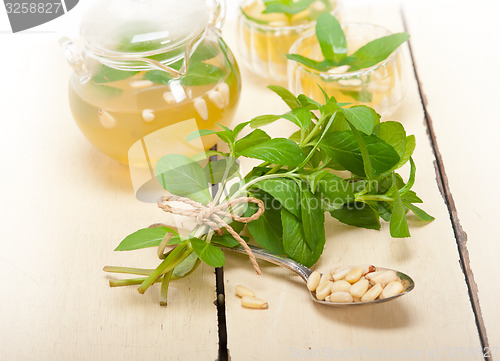 Image of Arab traditional mint and pine nuts tea