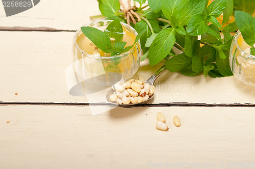 Image of Arab traditional mint and pine nuts tea