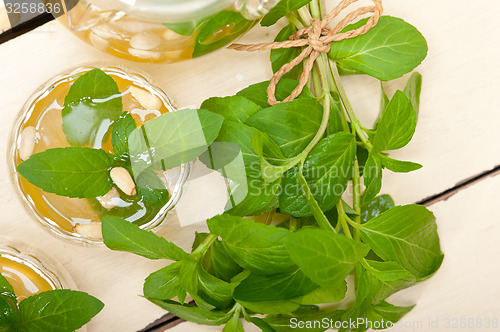 Image of Arab traditional mint and pine nuts tea