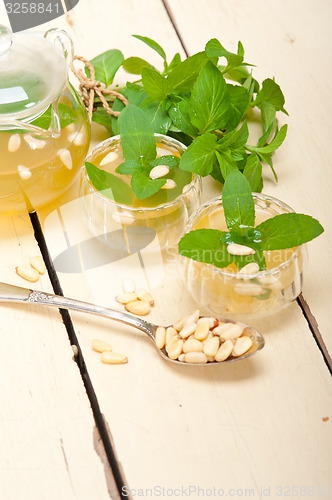 Image of Arab traditional mint and pine nuts tea