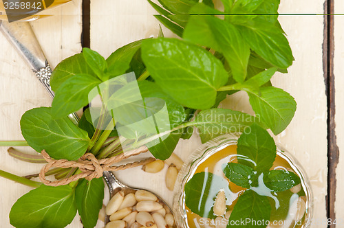 Image of Arab traditional mint and pine nuts tea