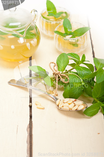 Image of Arab traditional mint and pine nuts tea