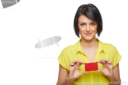 Image of Confident woman showing blank credit card