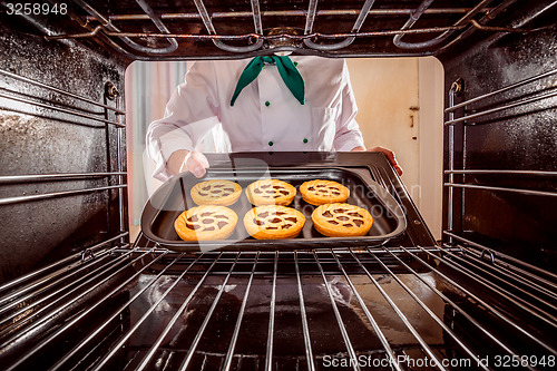 Image of Chef cooking in the oven.