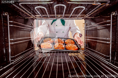 Image of Chef cooking in the oven.