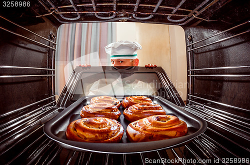 Image of Chef cooking in the oven.