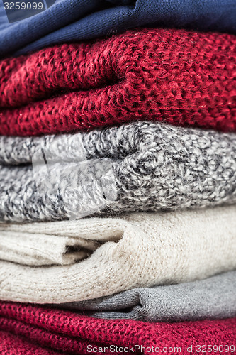 Image of Stack of handmade wool sweaters