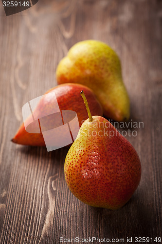 Image of Pears on wooden table