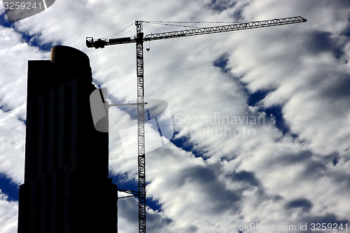 Image of skyscraper clouds and crane in  argentina