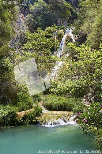 Image of Natural waterfall and lake in Polilimnio area. Greece