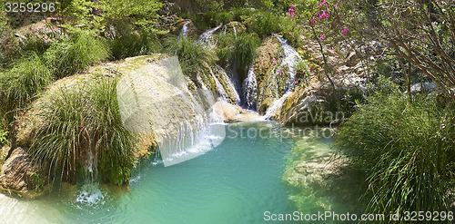 Image of Natural waterfall and lake in Polilimnio area. Greece