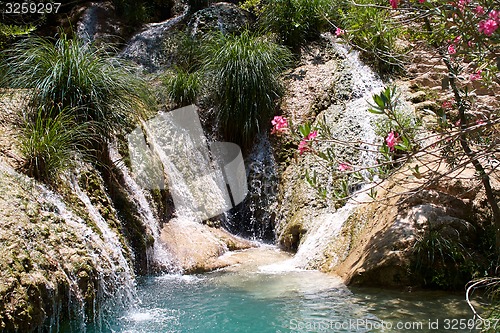 Image of Natural waterfall and lake in Polilimnio area. Greece