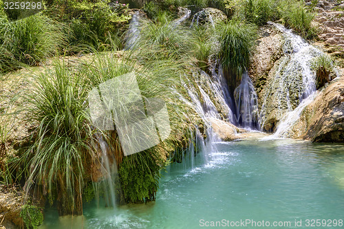 Image of Natural waterfall and lake in Polilimnio area. Greece