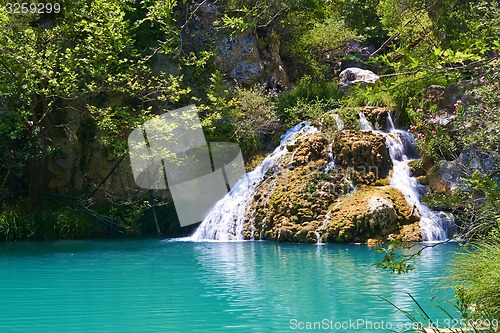 Image of Natural waterfall and lake in Polilimnio area. Greece