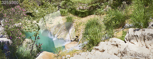 Image of Natural waterfall and lake in Polilimnio area. Greece