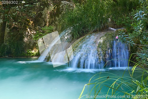 Image of Natural waterfall and lake in Polilimnio area. Greece