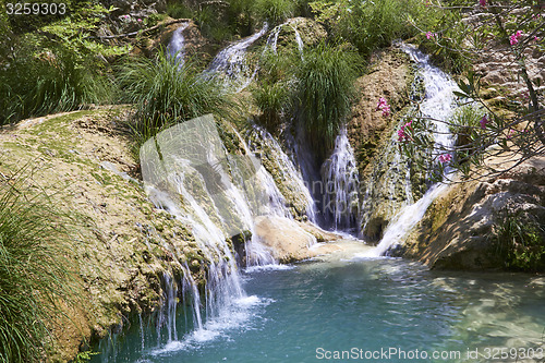 Image of Natural waterfall and lake in Polilimnio area. Greece