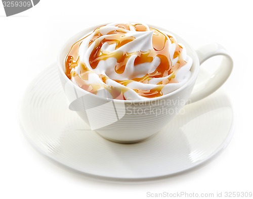 Image of cup of caramel latte with whipped cream