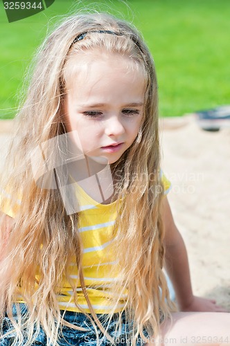 Image of Portrait of beautiful little girlwith long hair