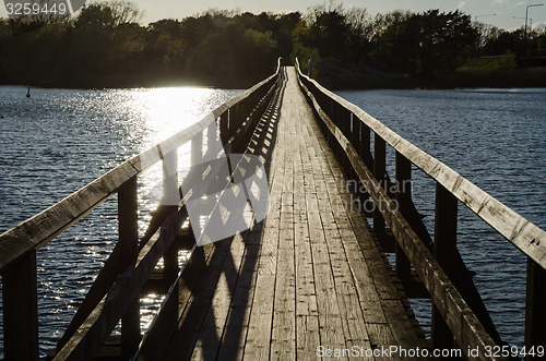 Image of Backlit footbridge