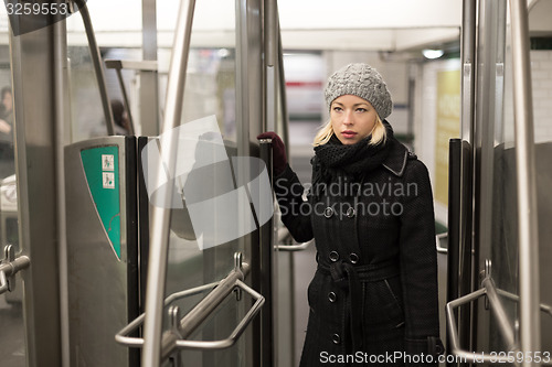 Image of Woman on subway.