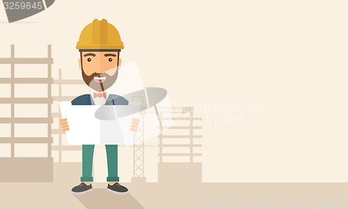 Image of Construction worker holding the plan.