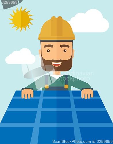 Image of Man putting a solar panel on the roof.