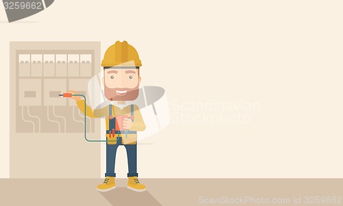 Image of Electrician repairing an electrical panel