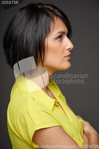 Image of Side view of business woman looking forward