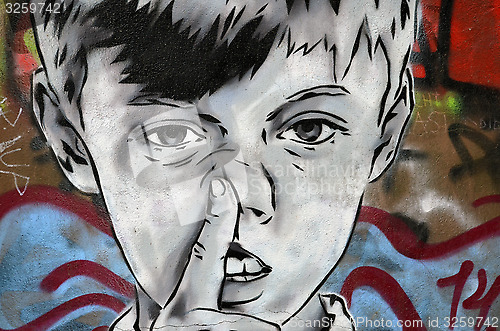 Image of Boy picking his nose