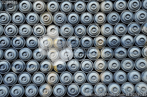 Image of Wall of spray paint cans