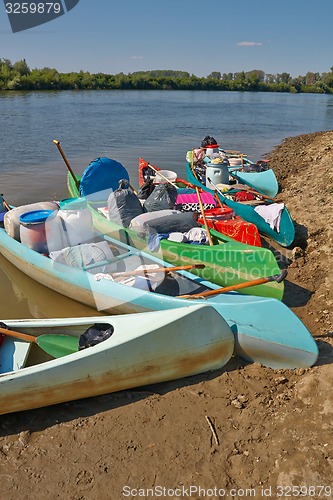 Image of Canoes on the Riverside