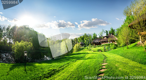 Image of Houses of log and landscape